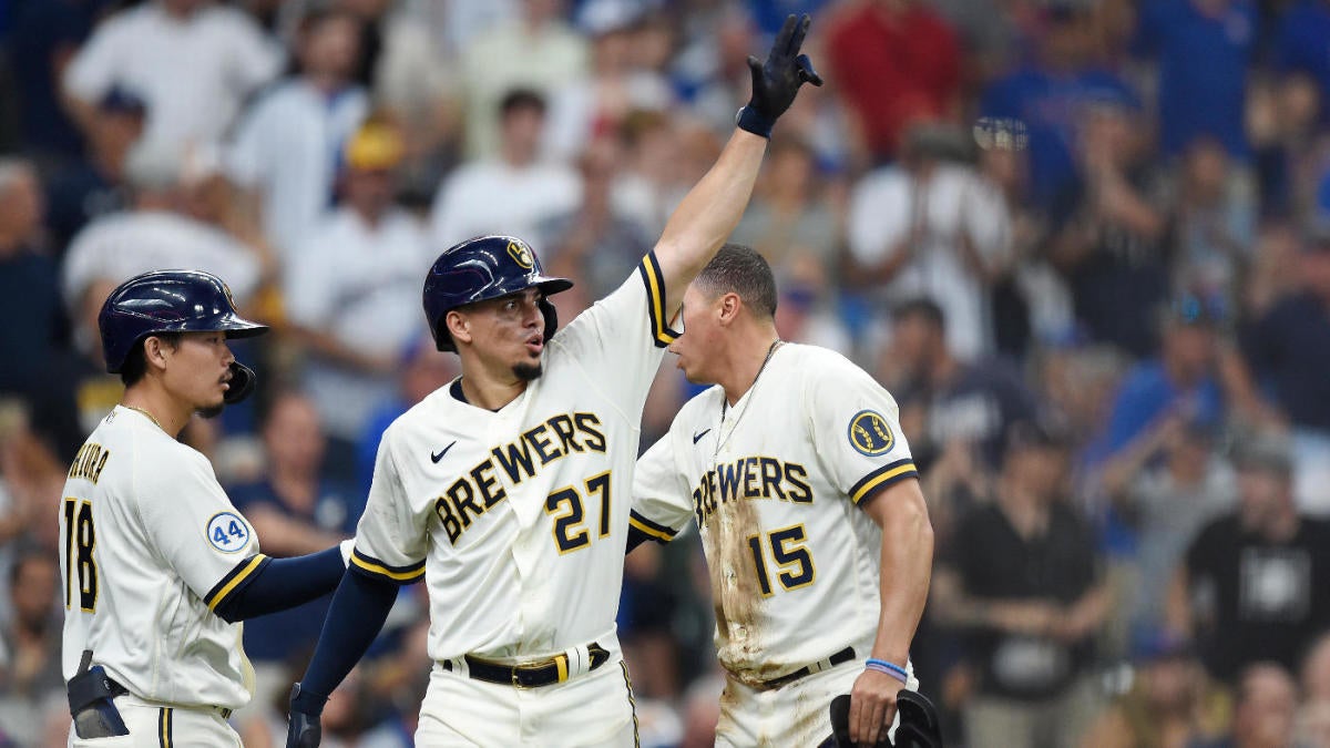 Luis Urias of the Milwaukee Brewers on the dugout step against the News  Photo - Getty Images