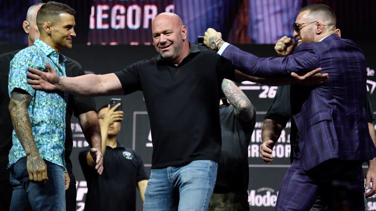 dustin-poirier-conor-mcgregor-presser.jpg