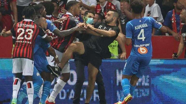 French soccer match halted as Nice fans storm field after ...