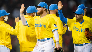 Why are the Boston Red Sox wearing yellow and blue uniforms today?