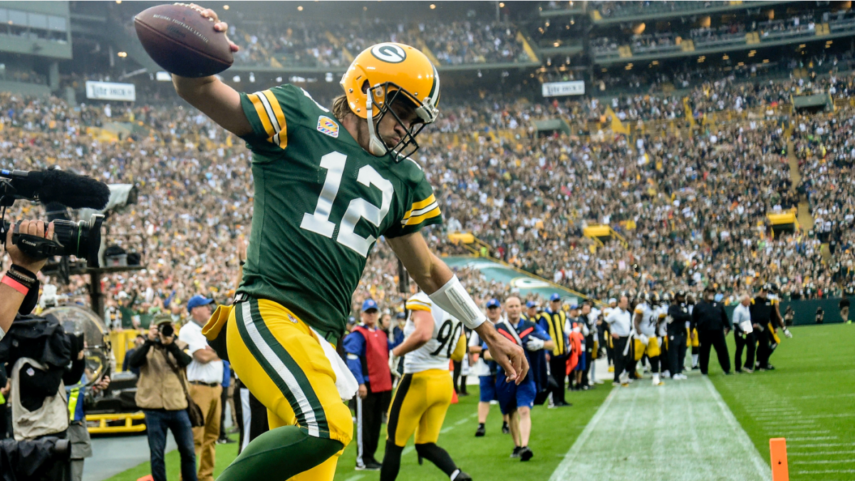 Aaron Rodgers rebounds with 4 TD passes during rout over the New