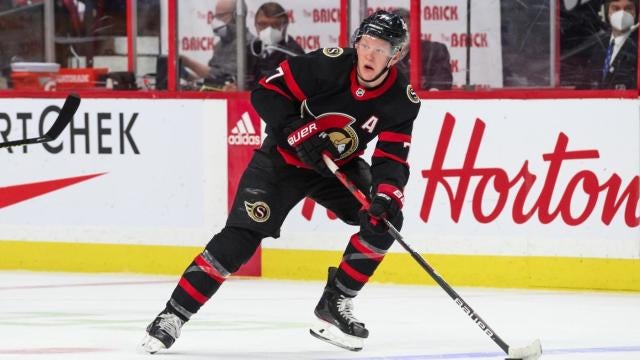 Ottawa Senators - Boston University's Brady Tkachuk checks