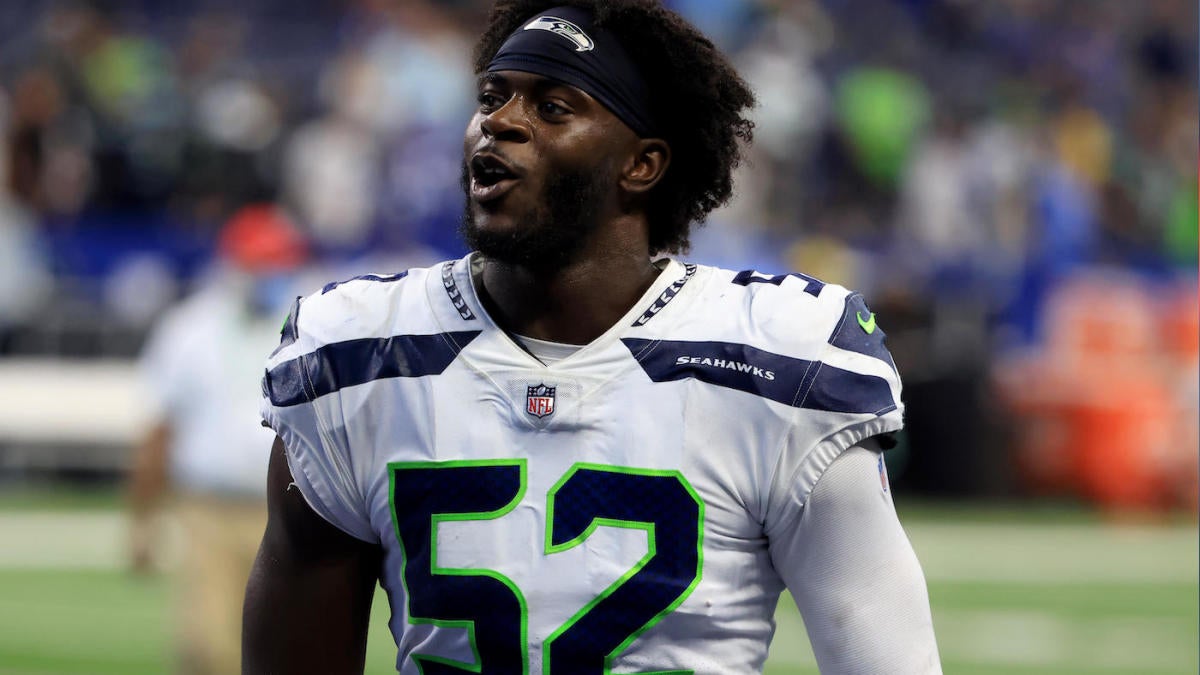 Seattle Seahawks defensive end Darrell Taylor (52) gets set during an NFL  football game against the