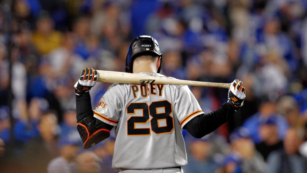 Giants catchers work on the back pick, a favorite Buster Posey play