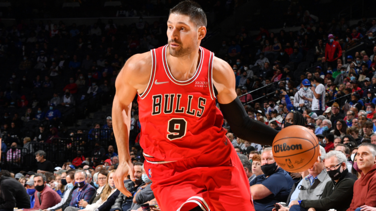 Chicago Bulls center Nikola Vucevic stands for his headshot during