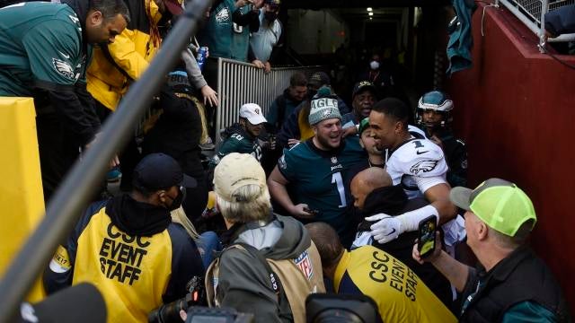 Eagles QB Jalen Hurts nearly sacked after railing collapses, fans fall at  FedEx Field