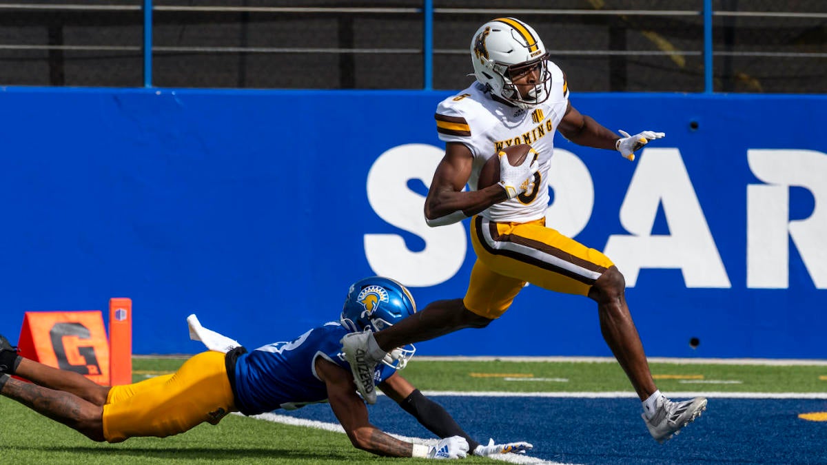 Wyoming wide receiver Isaiah Neyor (5) runs during the first half of an  NCAA football game against Connecticut on Saturday, Sept. 25, 2021, in East  Hartford, Conn. (AP Photo/Stew Milne Stock Photo - Alamy