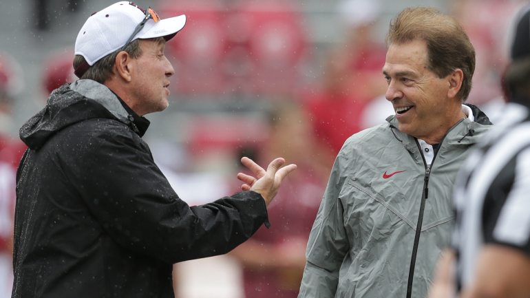 jimbo-fisher-nick-saban-rain-us.png
