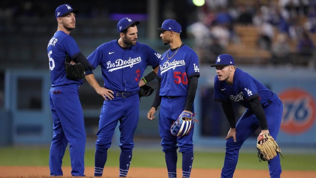 Kynlee Betts, center, greets her father, Los Angeles Dodgers right