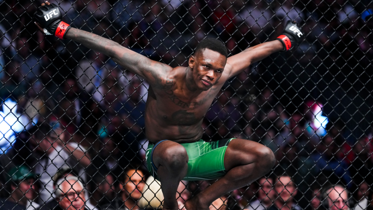 israel-adesanya-cage-pose.png
