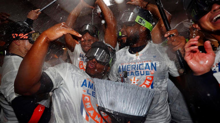 LOOK: Astros players use brooms in locker room to celebrate sweep of ...