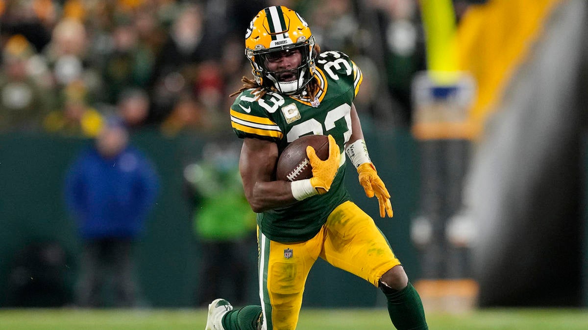 Green Bay Packers running back AJ Dillon waves to fans during Packers  News Photo - Getty Images