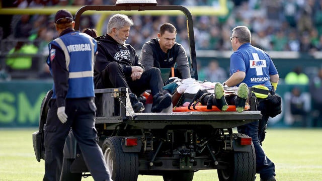 Two Eagles players stretchered off field after neck injuries