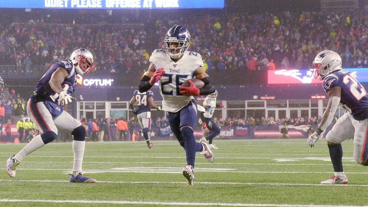 Tom Brady signs intercepted ball that was his final pass as a Patriot