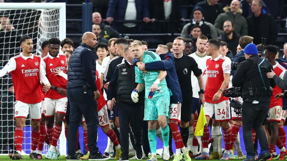 Arsenal goalkeeper Aaron Ramsdale appears to be kicked by