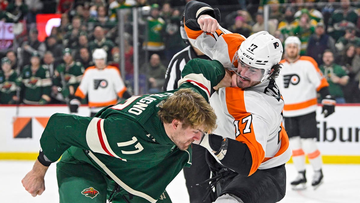 Philadelphia Flyers left wing Nicolas Deslauriers, left, and Minnesota Wild  right wing Ryan Reaves fight during the first period of an NHL hockey game  Thursday, Jan. 26, 2023, in St. Paul, Minn. (