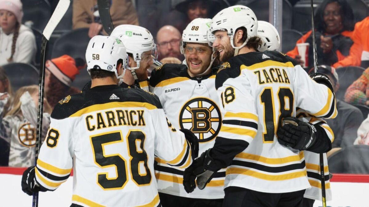 Bruins break NHL single-season wins record with victory over Flyers
