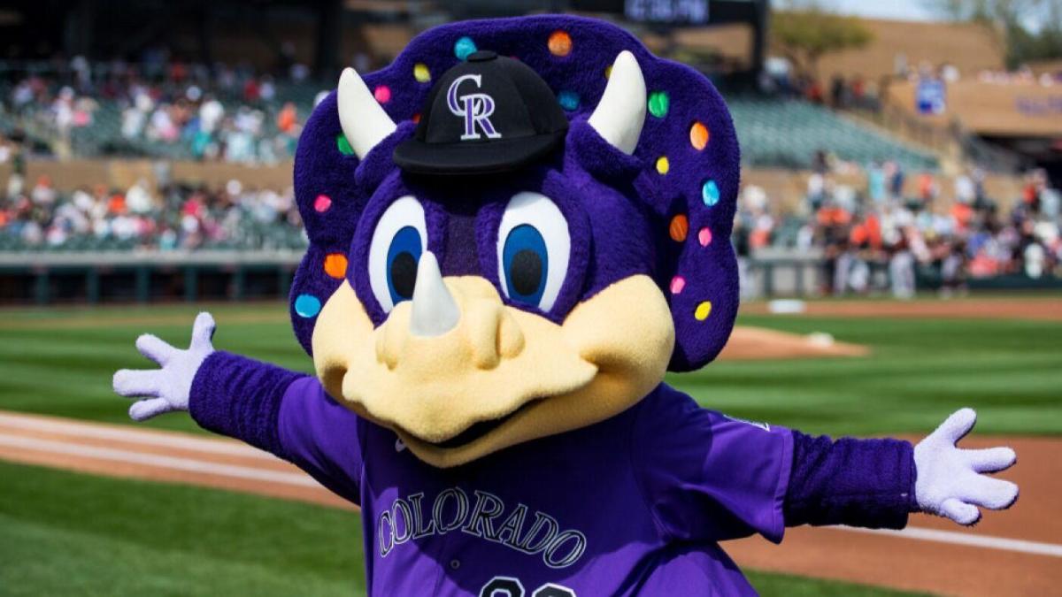 Dinger, the Colorado Rockies' mascot, interacts with fans at a