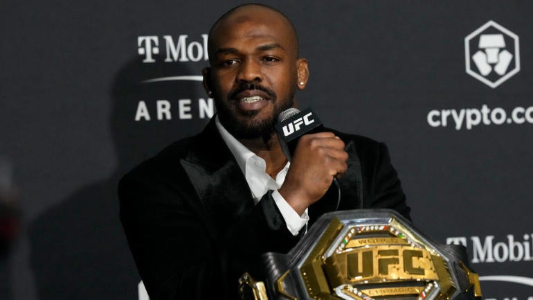 jon-jones-belt-presser.jpg