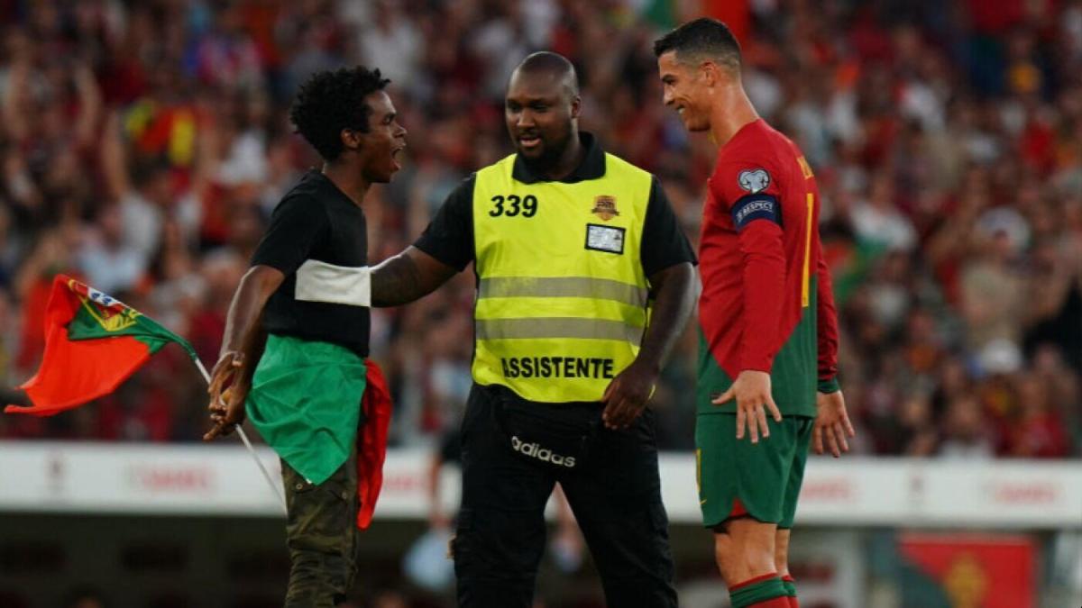 WATCH: Cristiano Ronaldo does iconic goal celebration with pitch invader during UEFA Euro qualifying match