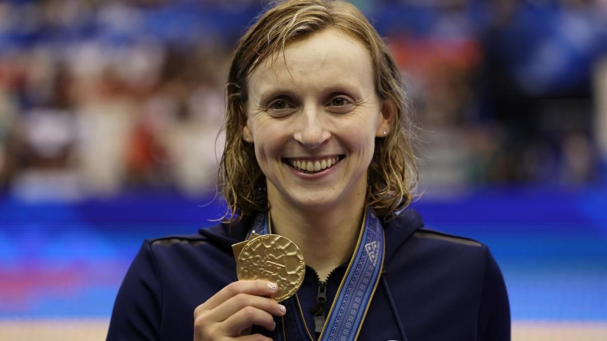Katie Ledecky ties Michael Phelps' record with her 15th career