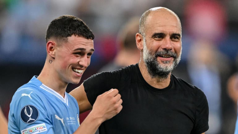 phil-foden-pep-guardiola-man-city-cbs-getty.jpg