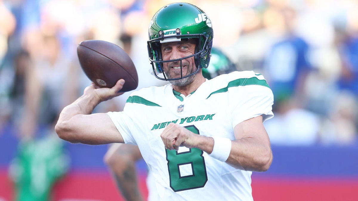 New York Jets quarterback Aaron Rodgers (8) calls out a play to his  teammates during the first half of an NFL preseason football game against  the New York Giants, Saturday, Aug. 26