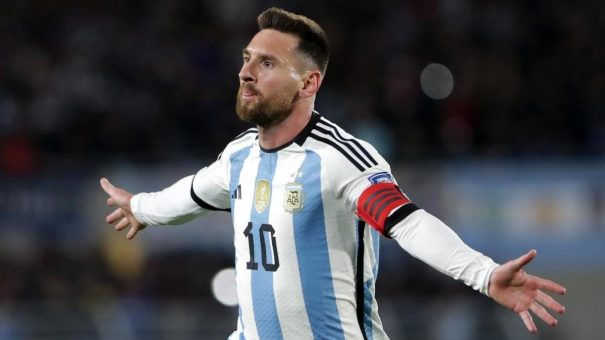 a beautiful woman playing soccer argentina national team jersey