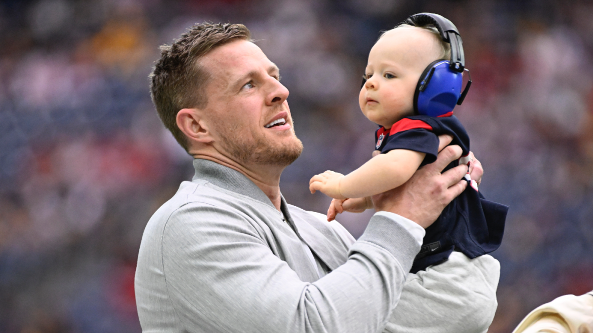 JJ Watt with Baby Son at Houston Texans Ring of Honor Induction