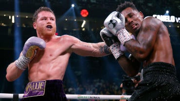 canelo-alvarez-jermell-charlo-punch.jpg