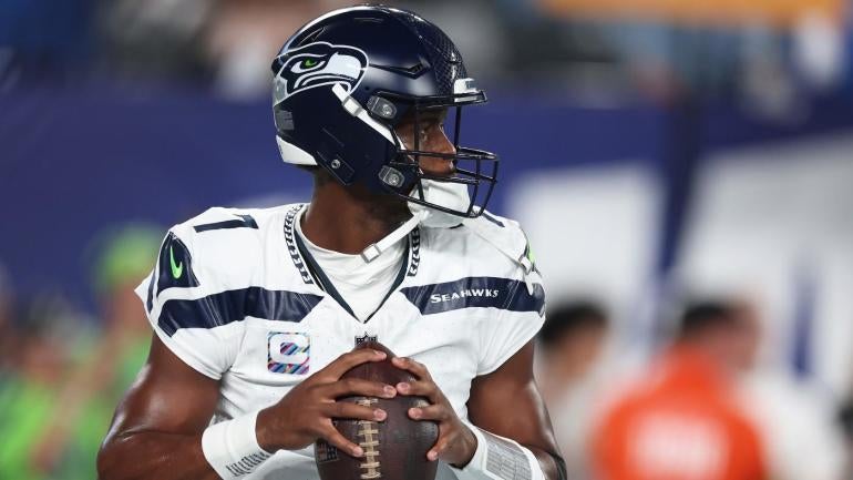 Seahawks' Geno Smith returns from knee injury vs. Giants after exiting ...