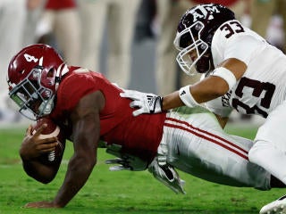 Santa Clara, United States. 22nd Jan, 2023. San Francisco 49ers wide  receiver Jauan Jennings (15) tries to fend off Dallas Cowboys defensive end  DeMarcus Lawrence (90) in the NFC Divisional Playoffs at