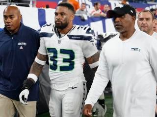 Dion Sanders of the Dallas Cowboys guards J.J. Birden of the Atlanta  News Photo - Getty Images