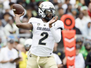 BOISE, ID - NOVEMBER 12: Boise State Broncos safety Tyreque Jones (21)  smiles during a college football game between the Wyoming Cowboys and the  Boise State Broncos on November 12, 2021, at