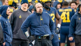 Michigan fires LB coach Chris Partridge one day after school accepts Jim Harbaugh's three-game suspension