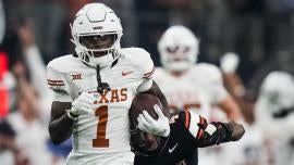 Xavier Worthy injury: Texas star WR exits 2023 Big 12 Championship Game after hurting lower leg