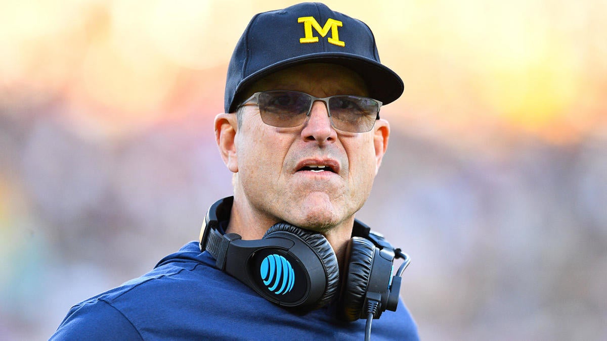 Michigan's Jim Harbaugh seeking termination protection in potential new contract amid NCAA probes, per report