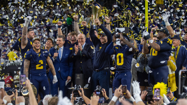 michigan-hoists-trophy-2024-champion.png