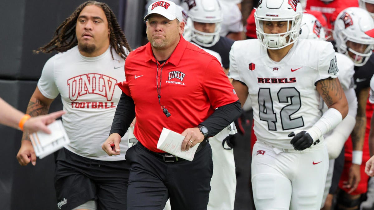 WATCH: UNLV coach Barry Odom rides live bull to raise funds for football program