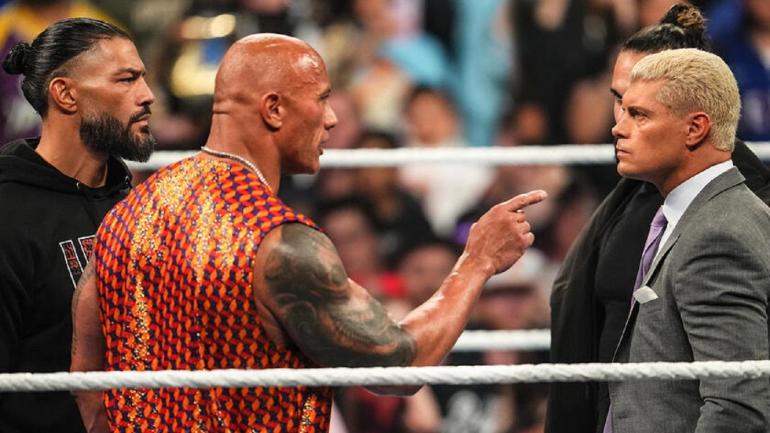 Roman Reigns The Rock Dwayne Johnson The Bloodline Cody rhodes Seth Rollins pro wrestling news WWE SmackDown WrestleMania 40