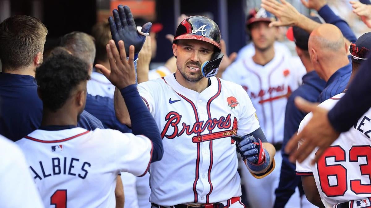 LOOK: Braves' Adam Duvall tosses ball into stands to knock down pyramid ...