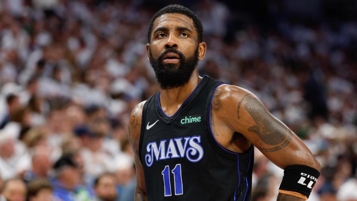 Mavericks' Kyrie Irving signs father Drederick to historic signature ...