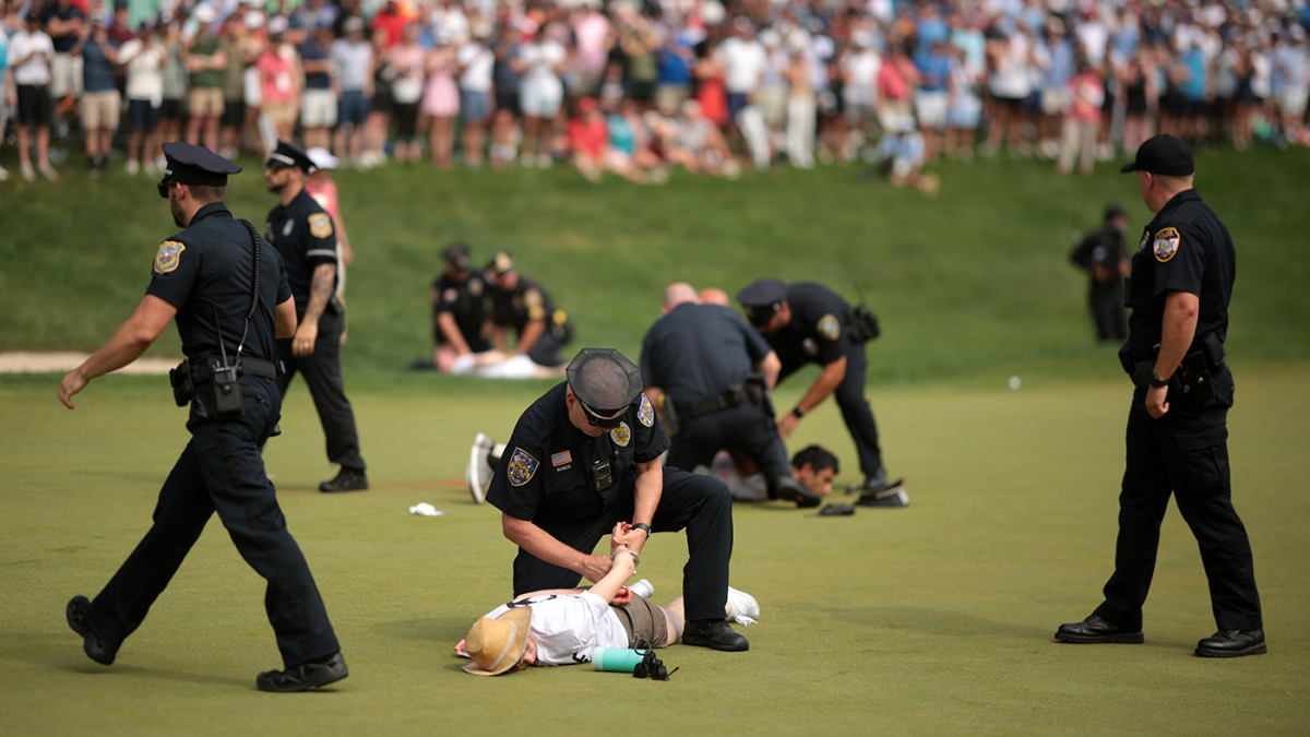 Protesters subdued after disrupting 2024 Travelers Championship by throwing smoke bombs on 72nd hole