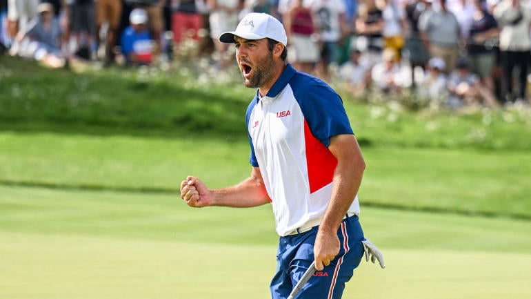 scottie-scheffler-fist-pump-olympics-g.jpg
