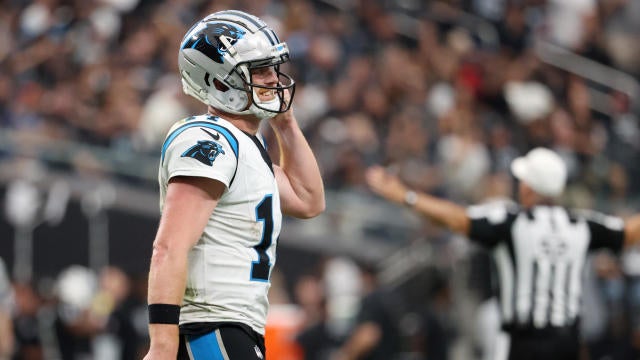Andy Dalton passes for 319 yards and 3 TDs to lead Panthers past Raiders 36-22 for first win