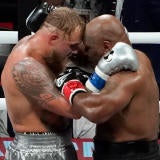 mike-tyson-jake-paul-embrace.jpg