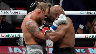 mike-tyson-jake-paul-embrace.jpg