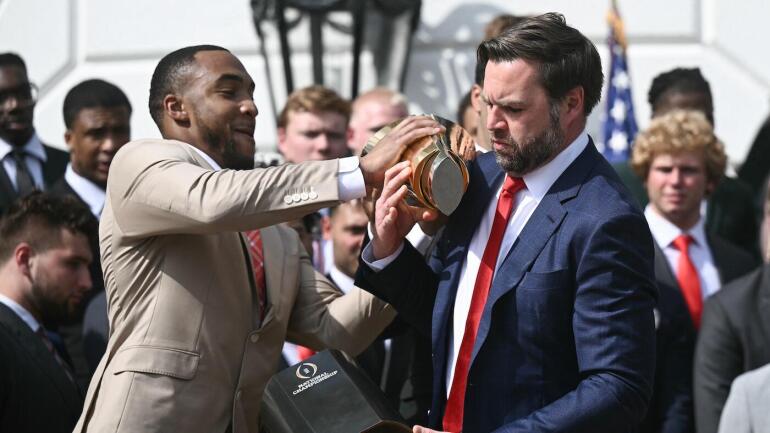 US-POLITICS-TRUMP-COLLEGE-FOOTBALL