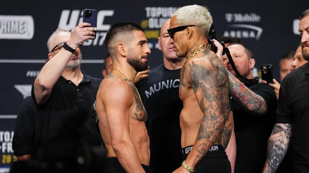https://sportshub.cbsistatic.com/i/r/2025/06/28/cd9f0b05-a32e-4129-a38b-89c4637b0bf8/thumbnail/1200x675/55178491d3334c9e10ba2d8bc6898f22/topuria-oliveira-weighins.jpg