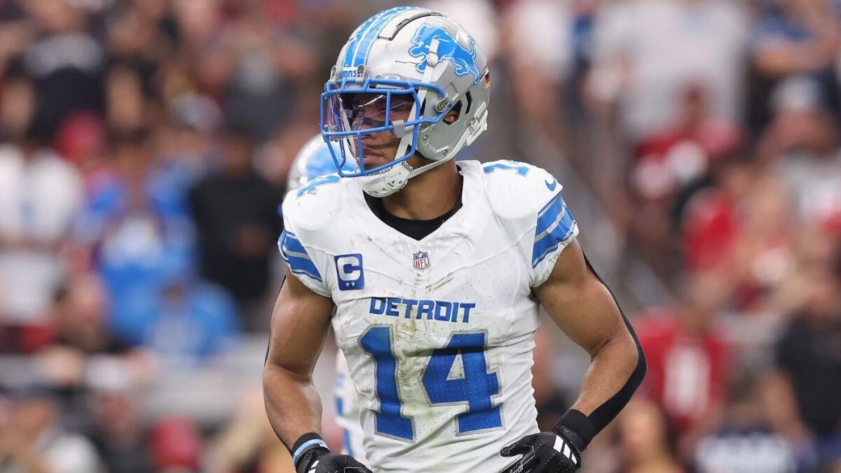 Why Lions WR Amon-Ra St. Brown wears the wrong No. 14 jersey - CBSSports.com